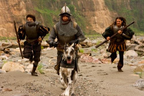 Die Conquistadoren haben Hunde, um die Indios zu verfolgen.